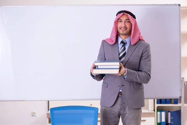 Young handsome arab teacher wearing suit — Stock Photo, Image