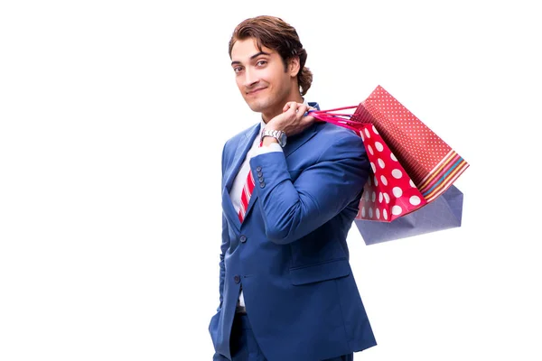 Elegante hombre de negocios con bolsas aisladas en blanco —  Fotos de Stock