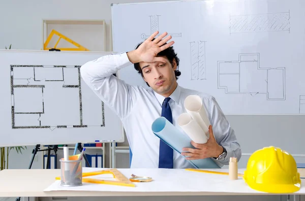 Young handsome architect working on the project — Stock Photo, Image