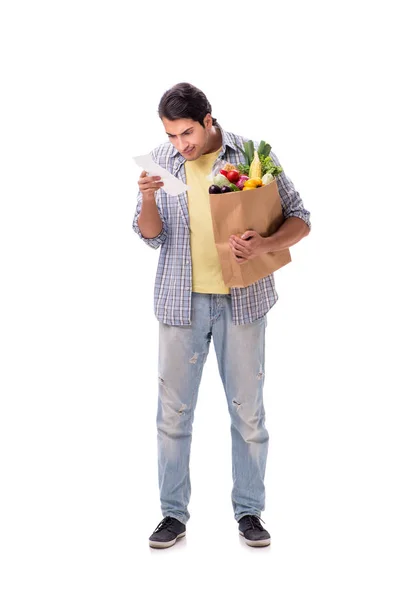 Jeune homme avec son épicerie sur blanc — Photo