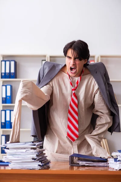 Crazy young man in straitjacket at the office — Stock Photo, Image