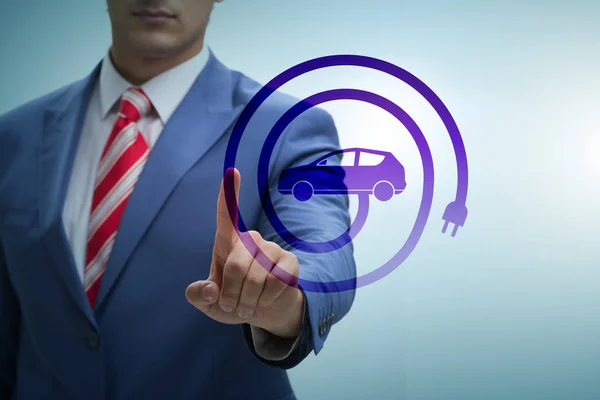 Businessman in electic vehicle concept — Stock Photo, Image