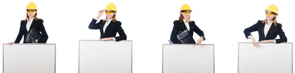 Young female builder with whiteboard — Stock Photo, Image