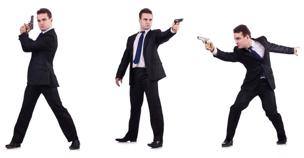 Hombre de traje con pistola aislada en blanco — Foto de Stock