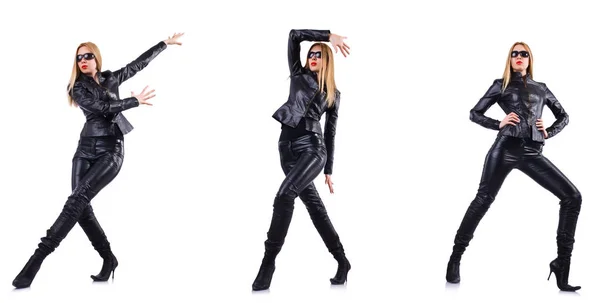 Dansande kvinna i svart läder kostym — Stockfoto