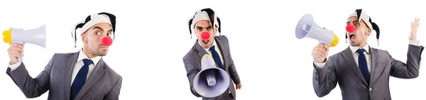 Empresário palhaço engraçado com megafone — Fotografia de Stock