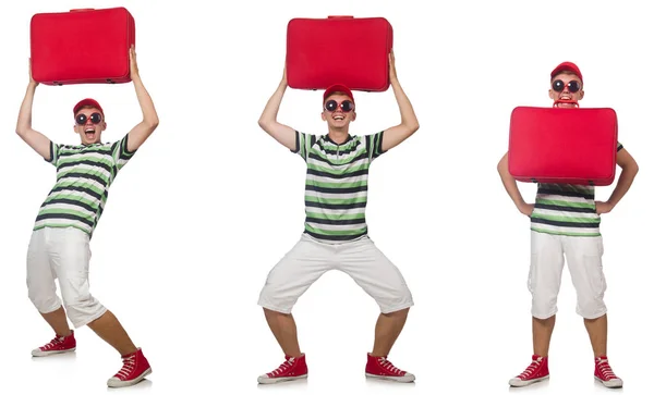 Young man with red suitcase isolated on white — Stock Photo, Image