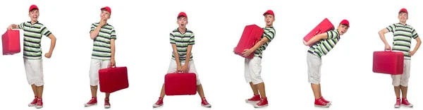 Ung man med röd resväska isolerad på vitt — Stockfoto