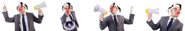 Funny clown businessman with megaphone — Stock Photo, Image