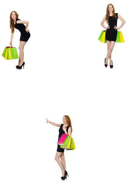 Junge Frau mit Einkaufstaschen im Ladenhüter-Konzept — Stockfoto