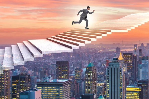 Businessman climbing career ladder over city — Stock Photo, Image