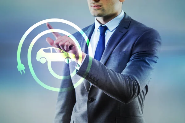 Businessman in electic vehicle concept — Stock Photo, Image