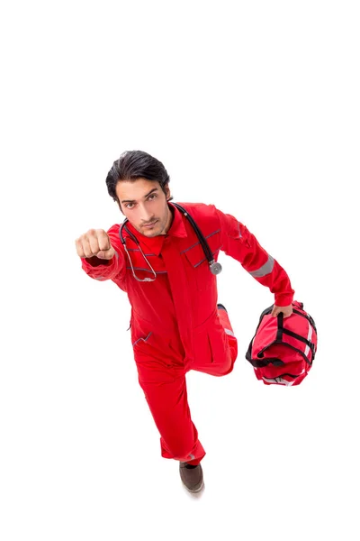 Joven paramédico en uniforme rojo aislado en blanco —  Fotos de Stock