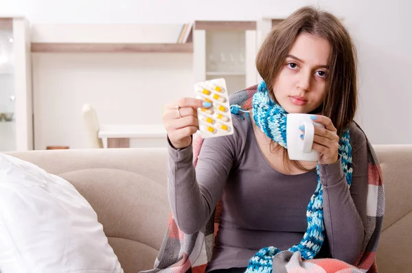 Sick young woman suffering at home — Stock Photo, Image