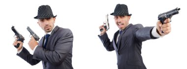 Tabanca ile takım elbiseli Genç gangster 