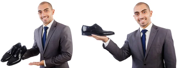 Man met schoenen geïsoleerd op wit — Stockfoto