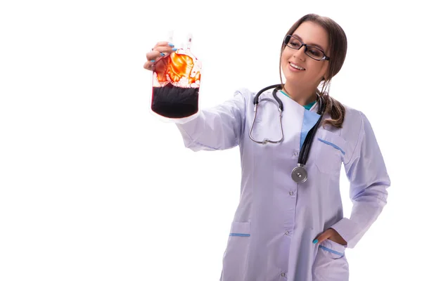 Young female doctor with blood bag isolated on white — Stock Photo, Image