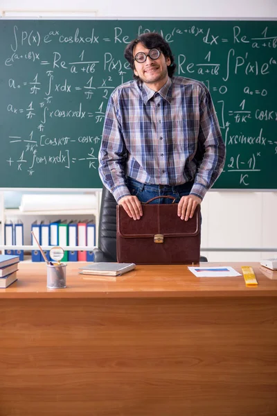 Funny male math teacher in the classroom — Stock Photo, Image