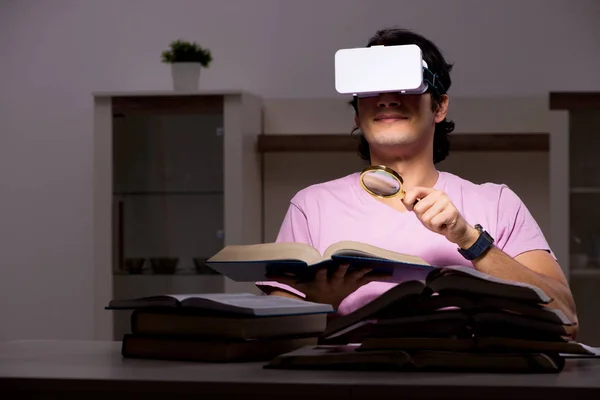 Male student with virtual glasses late at home — Stock Photo, Image