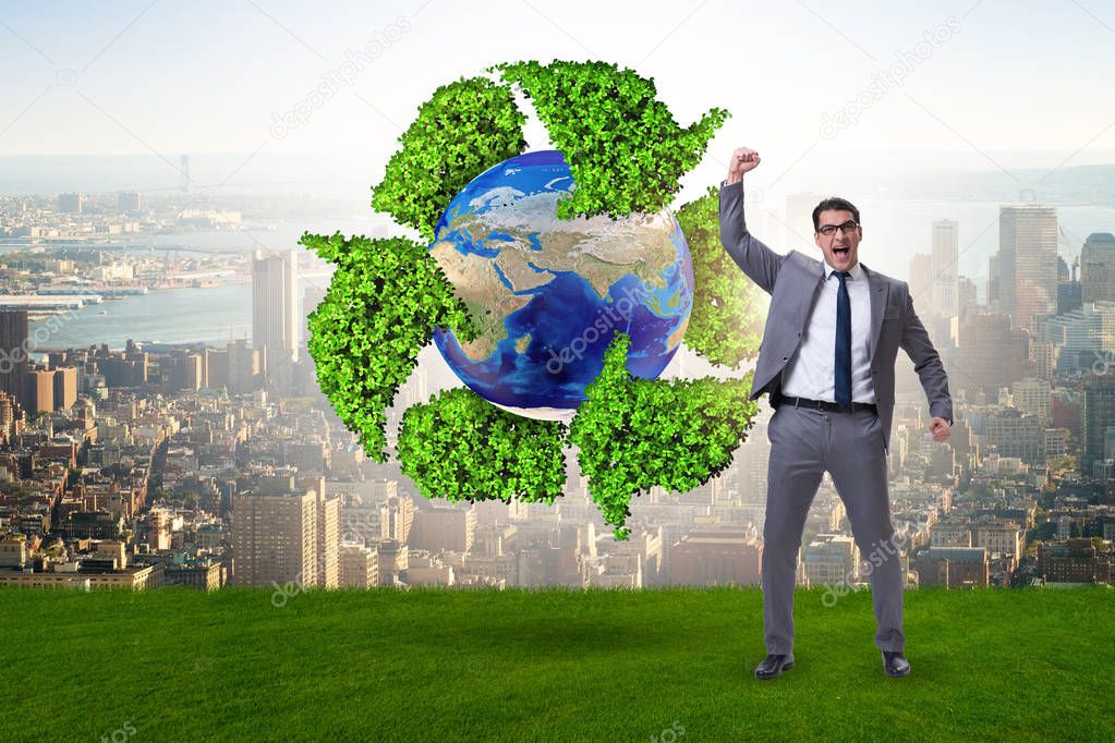 Businessman in recycling ecological concept