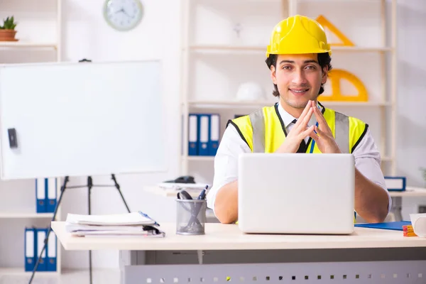 Male construction engineer working in the office — Stock Photo, Image