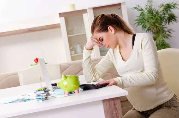 Young pregnant woman in budget planning concept — Stock Photo, Image