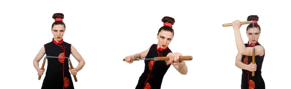 Donna divertente con nunchaku isolati su bianco — Foto Stock