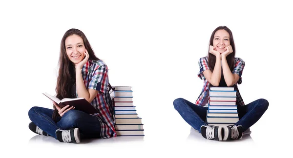 Giovane studente con libri isolati sul bianco — Foto Stock