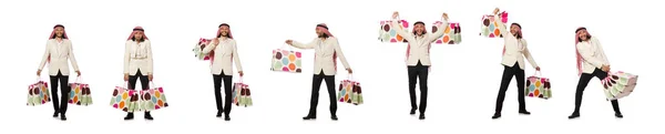 Uomo arabo con shopping bags su bianco — Foto Stock