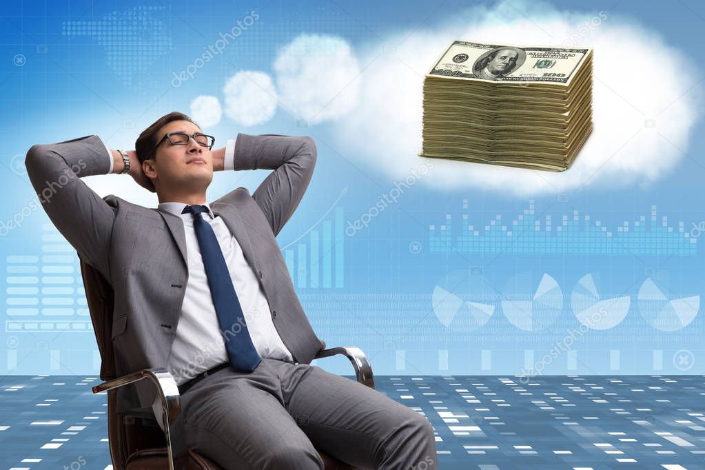 Businessman dreaming of money dollars