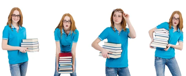 Estudante feminina com muitos livros isolados em branco — Fotografia de Stock