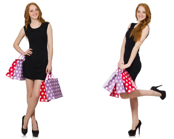 Junge Frau mit Einkaufstaschen im Ladenhüter-Konzept — Stockfoto