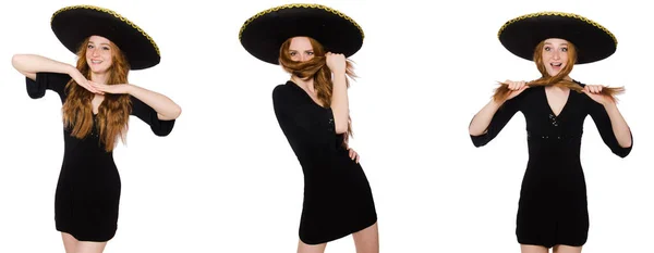 Joven pelirroja en vestido negro con sombrero negro — Foto de Stock