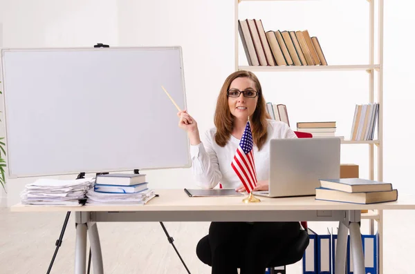 Female english teacher in the classroom — Stock Photo, Image