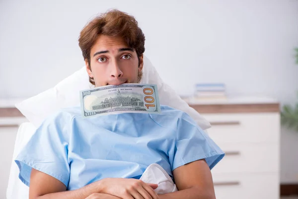 Young male patient lying on couch in hospital