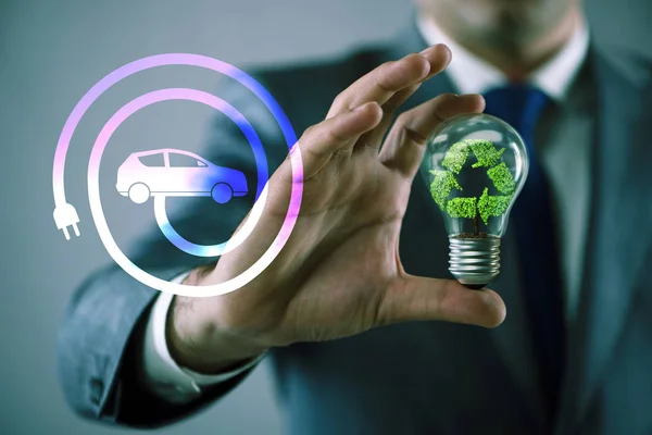 Electric vehicle concept with lightbulb — Stock Photo, Image