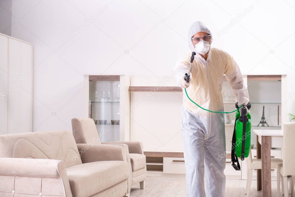 Pest control contractor working in the flat 