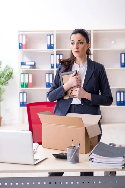 Young female employee being fired from her work