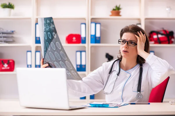 Aged female doctor radiologist in the clinic — Stock Photo, Image