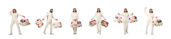 Uomo arabo con shopping bags su bianco — Foto Stock