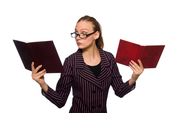 Jovem mulher de traje roxo segurando livros — Fotografia de Stock