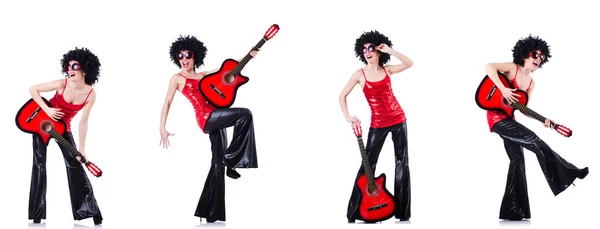 Woman in afro wig playing guitar — Stock Photo, Image