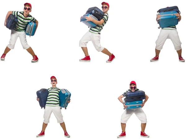 Young man with heavy suitcases isolated on white — Stock Photo, Image