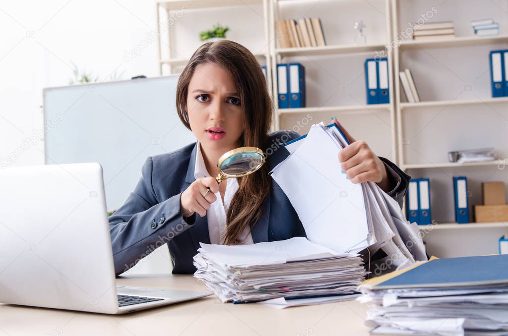 Beautiful female employee unhappy with excessive work