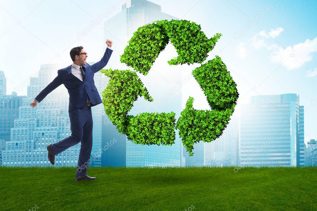 Businessman in recycling ecological concept