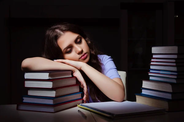 Young female student preparing for exams late at home — Stock Photo, Image