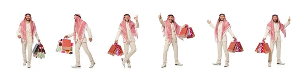 Uomo arabo con shopping bags su bianco — Foto Stock