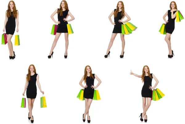 Ung kvinna wth väskor i shopaholic-konceptet — Stockfoto