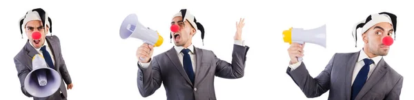 Rolig clown affärsman med MegaFon — Stockfoto