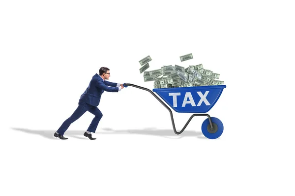 Businessman pushing wheelbarrow full of money in tax concept — Stock Photo, Image